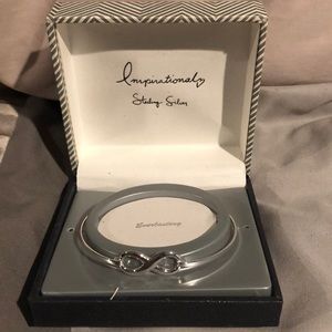 Sterling silver infinity bangle